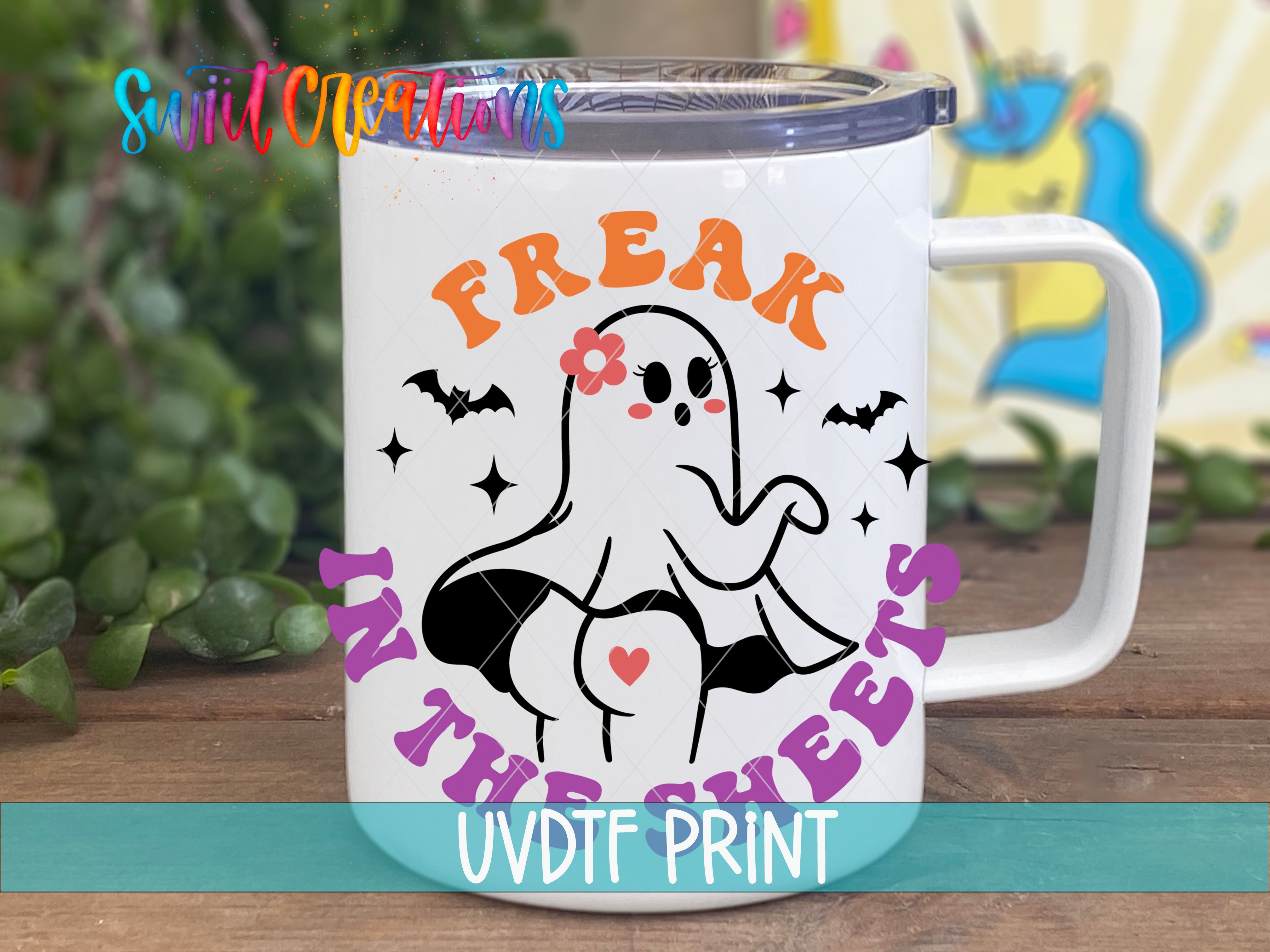 a white coffee mug with the words freak on it