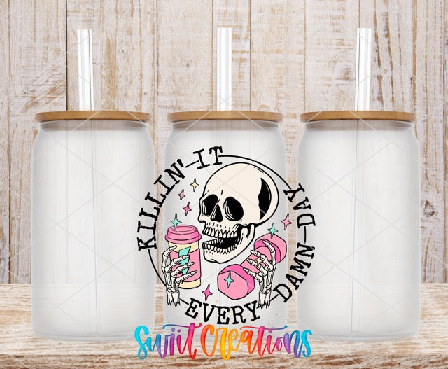 two tumbles with a skull holding a cup of coffee