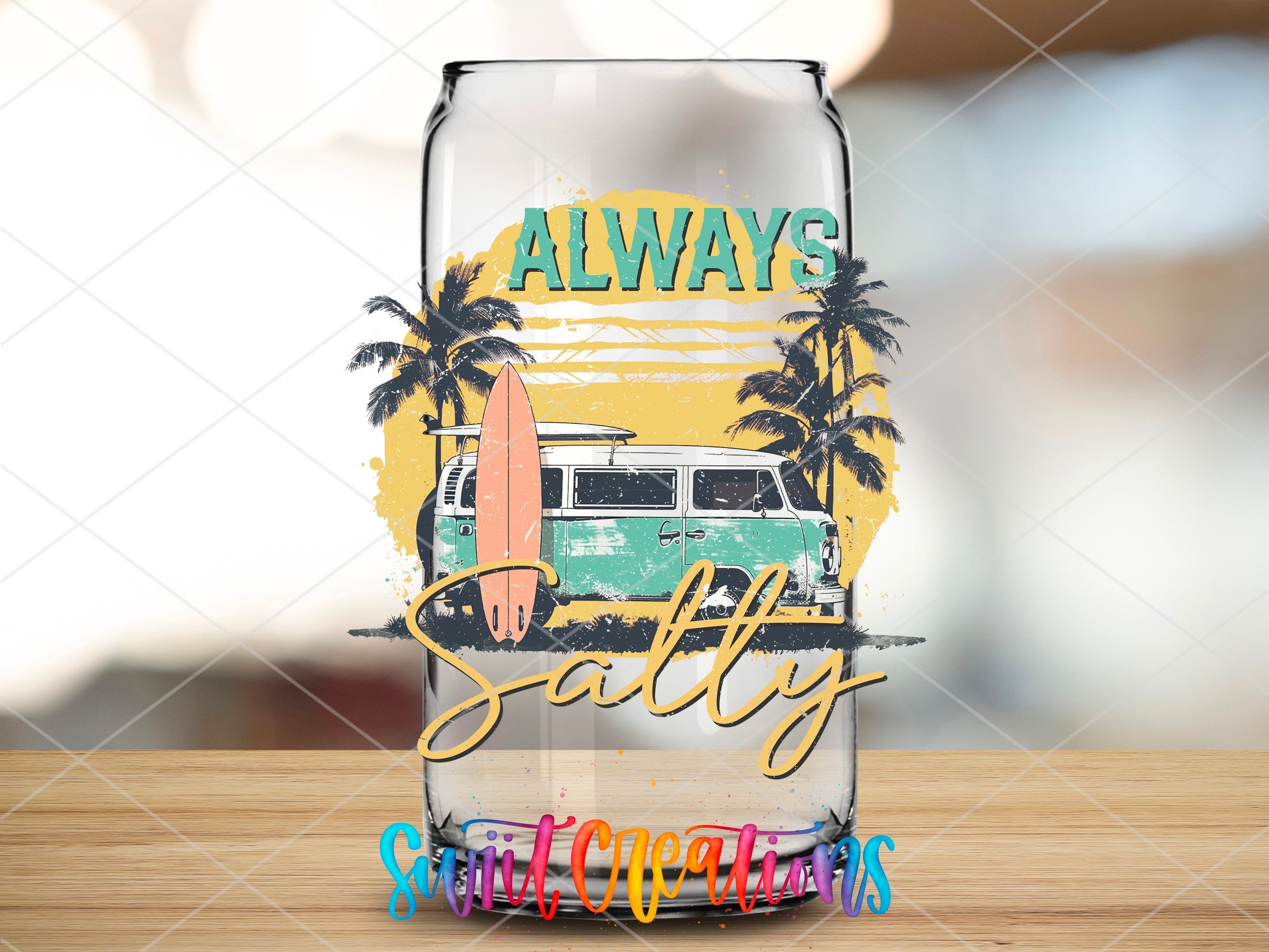 a glass with a picture of a bus and palm trees