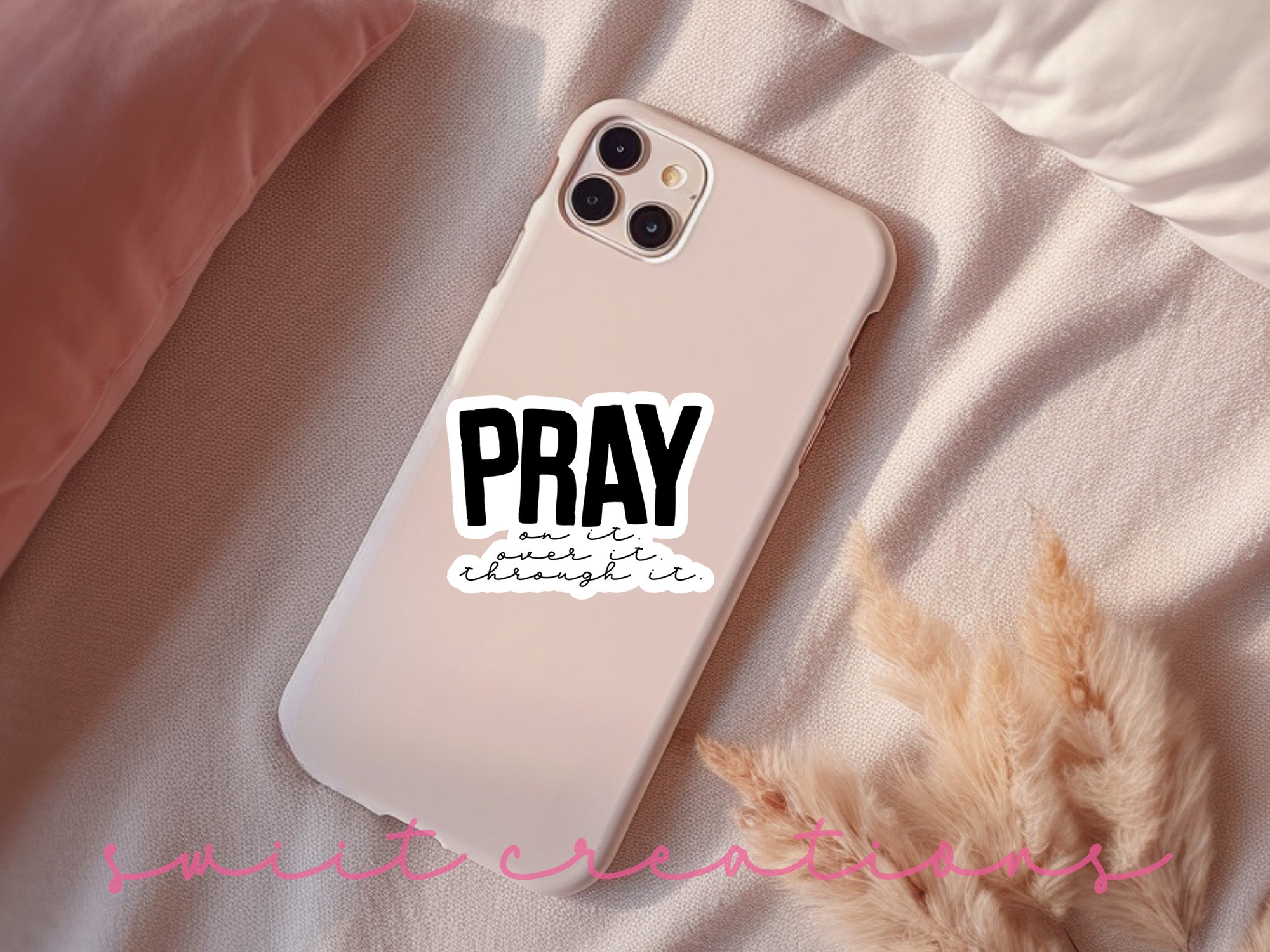 a phone case with the words pray on it