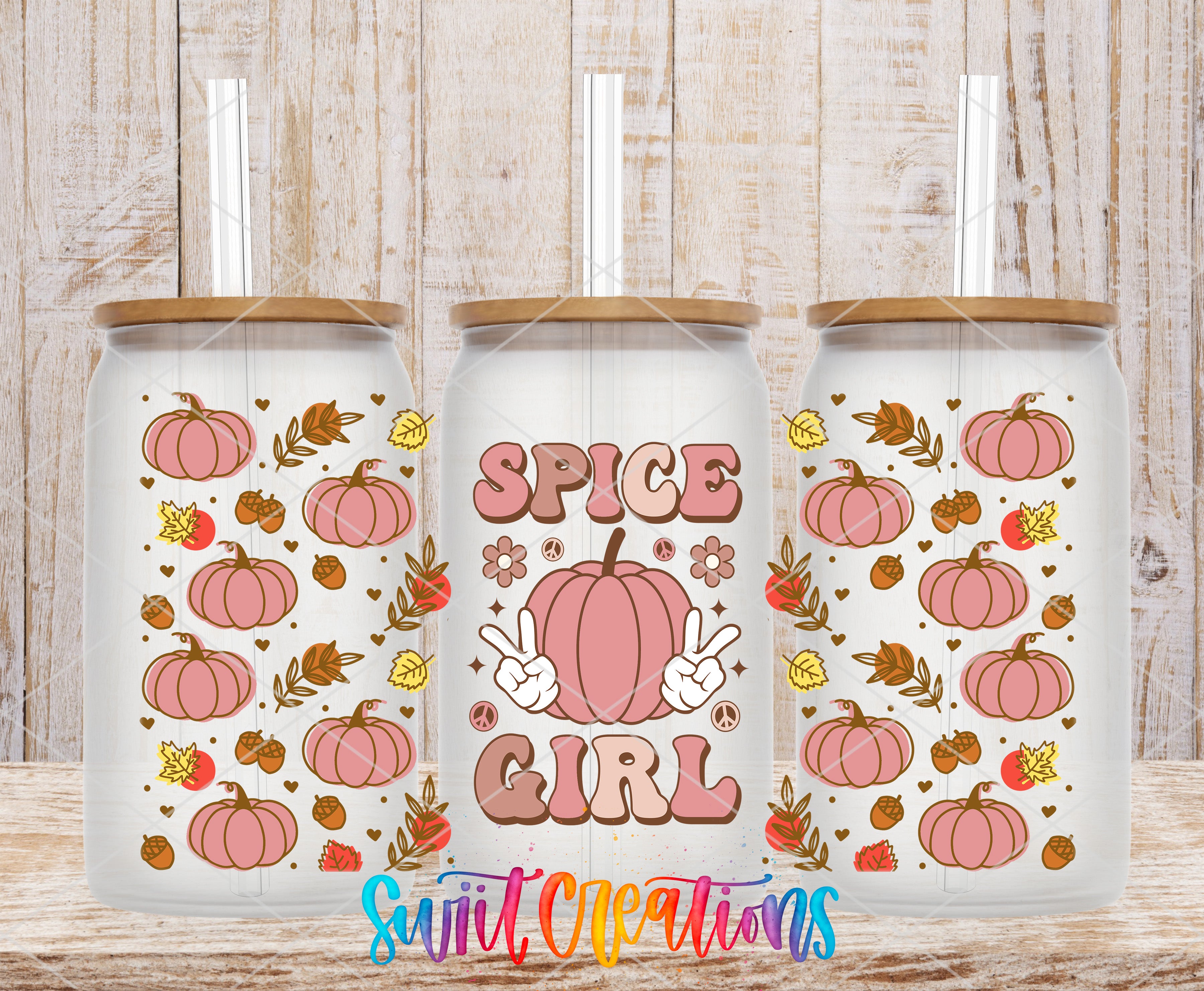 three glass tumblers with a pumpkin and peace sign design, along with the text "SPICE GIRL" printed on them.