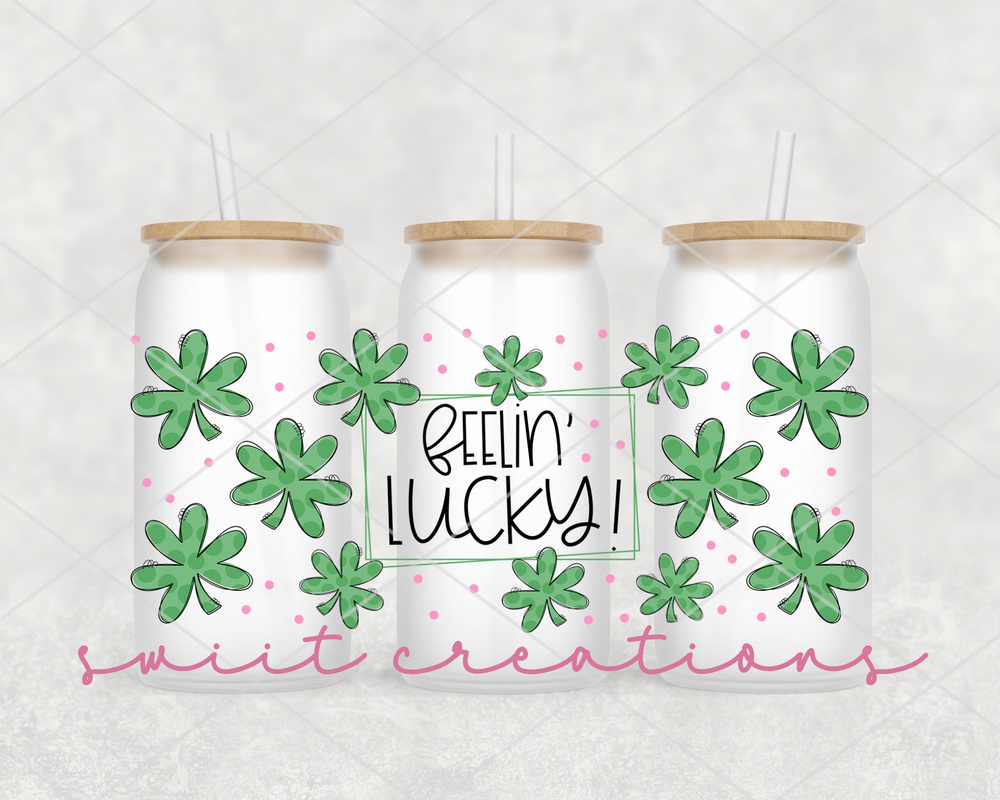 three beer cans with straws on top of them
