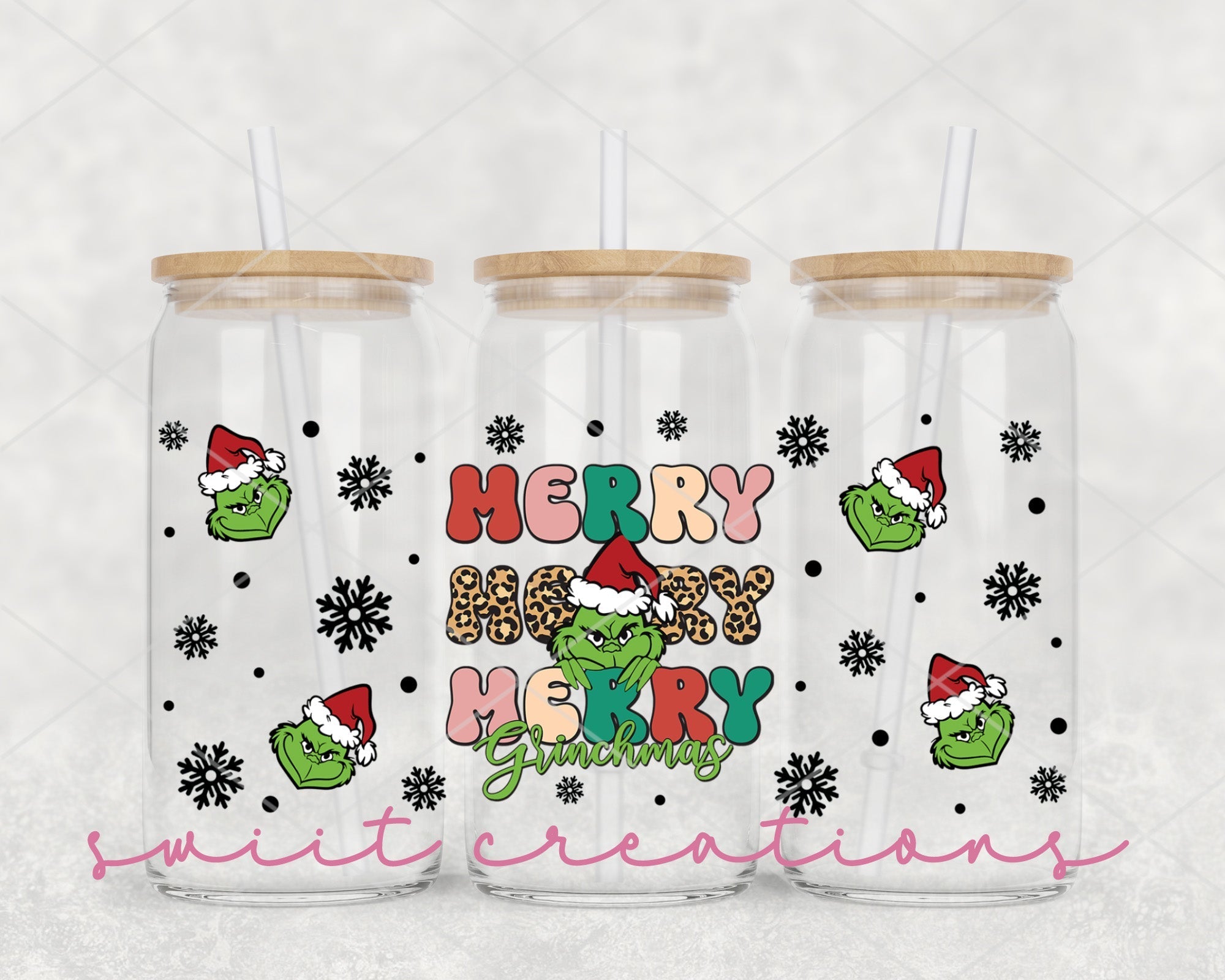 a couple of glasses with christmas designs on them