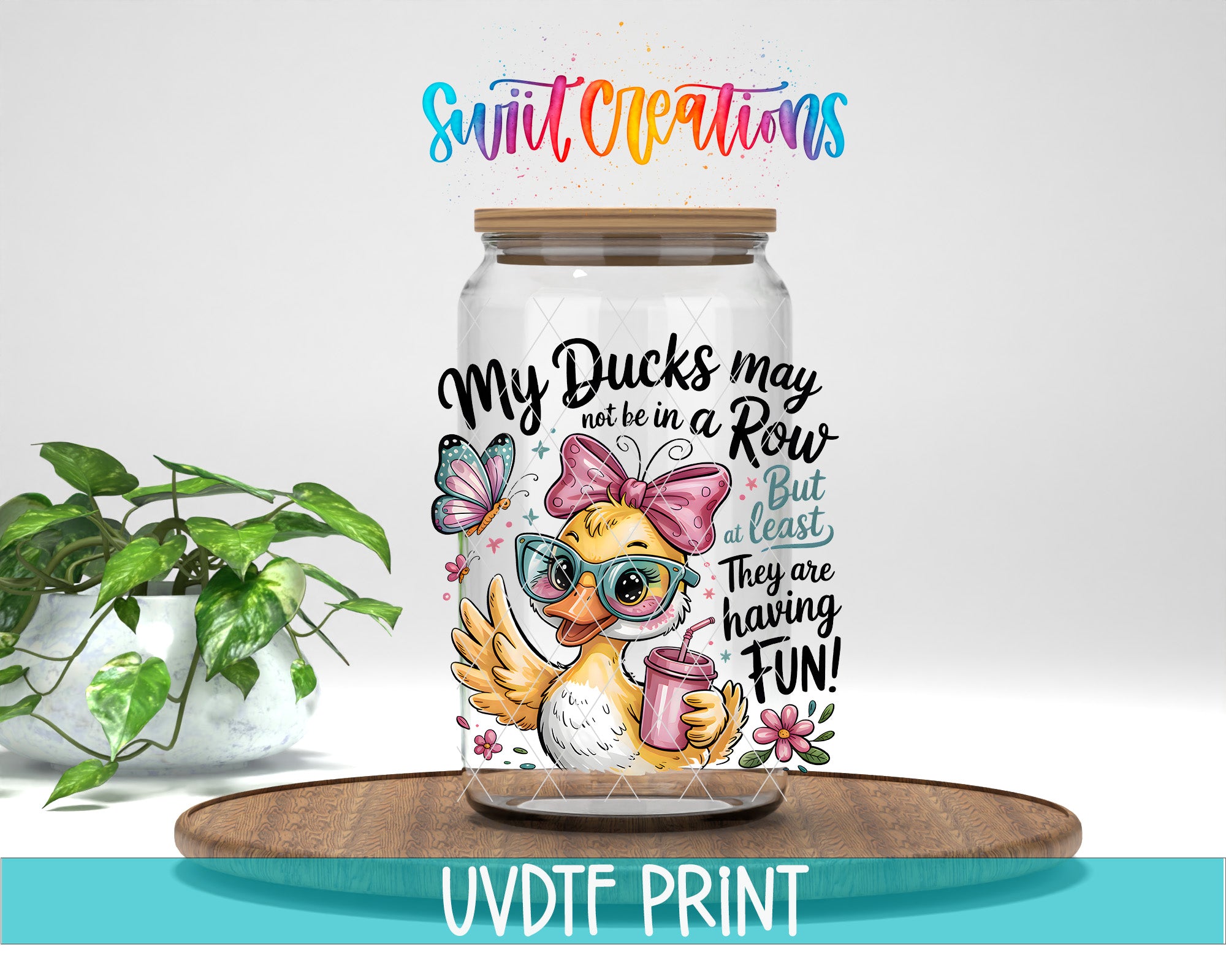 a glass jar with a cartoon duck wearing sunglasses and holding a drink, surrounded by various decorative elements such as butterflies and flowers.
