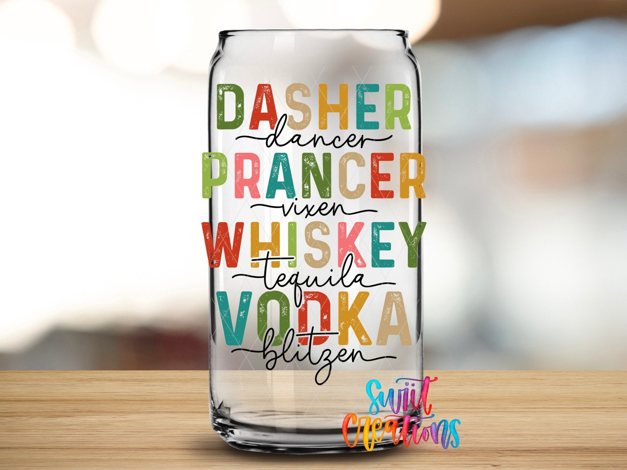 Swiit Creations UV DTF Reindeer Names and Holiday Spirits transfer applied to a clear glass can