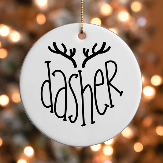 Dasher Reindeer Name ornament UV DTF transfer on a round white ornament with a bokeh light background