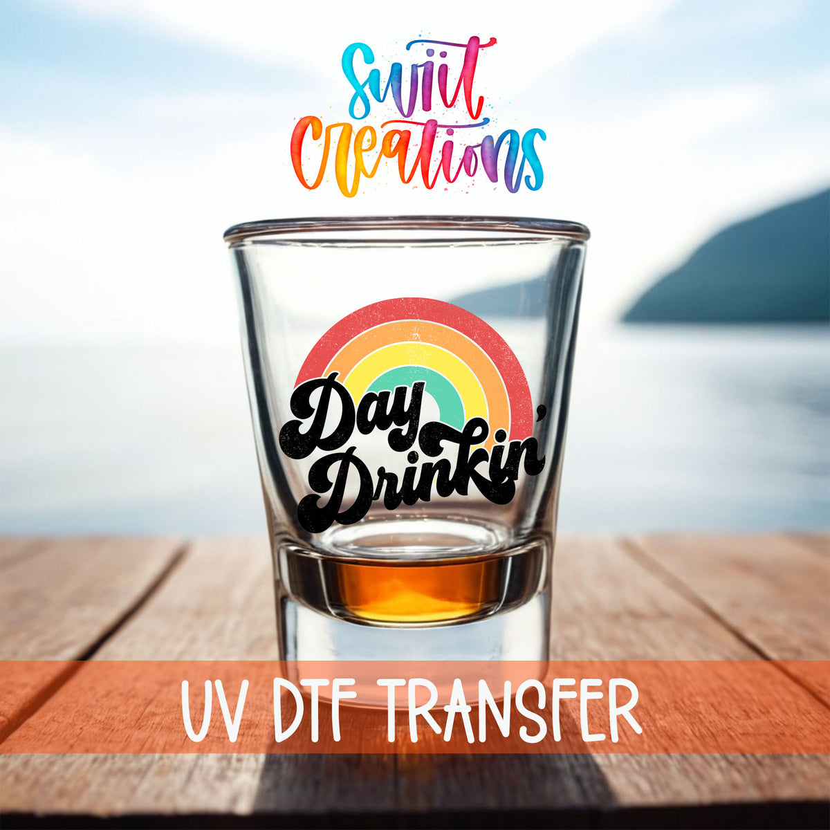 Day Drinkin' shot glass UV DTF transfer on a filled shot glass on a dock by the water
