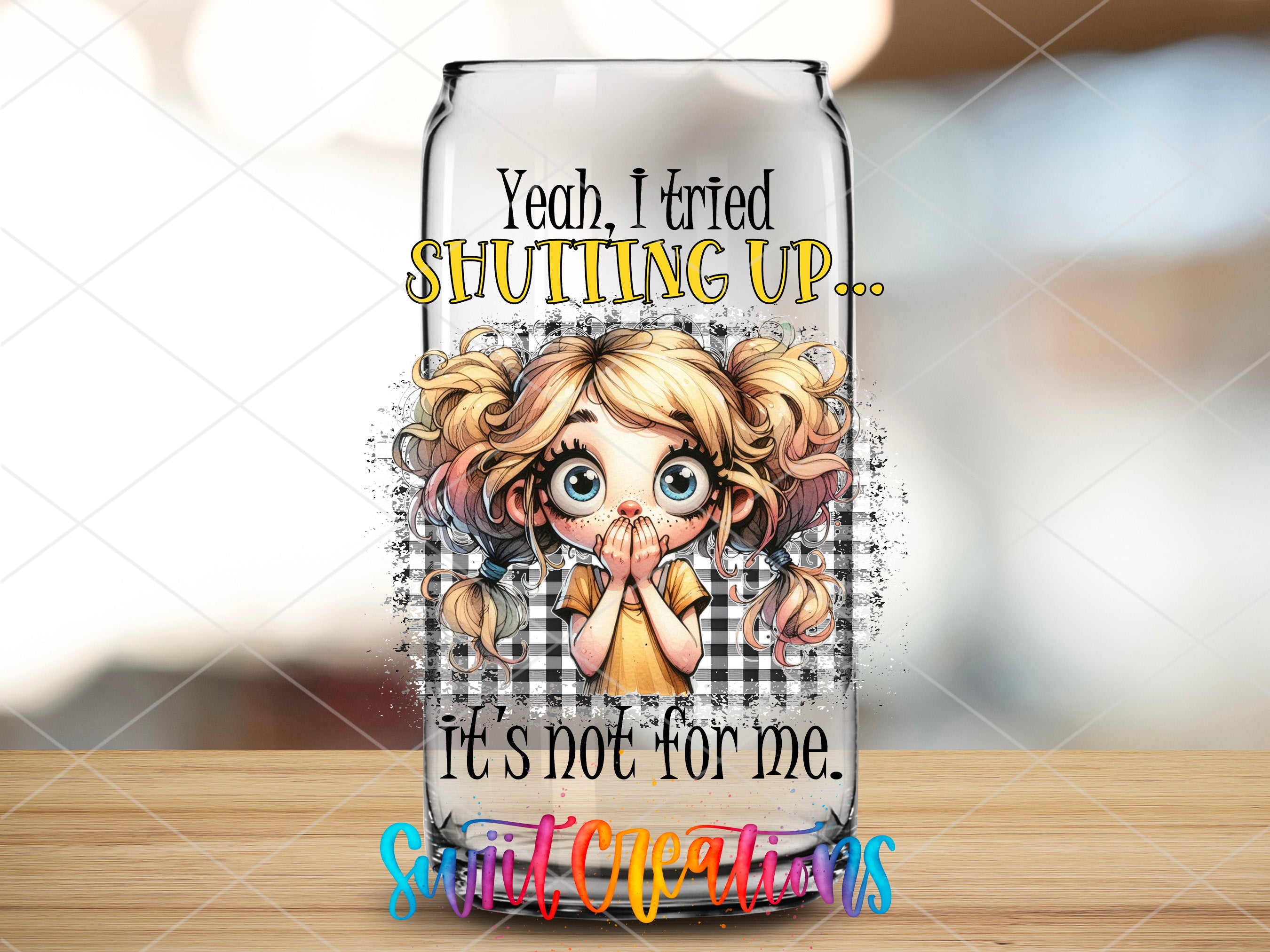a glass with a picture of a girl on it