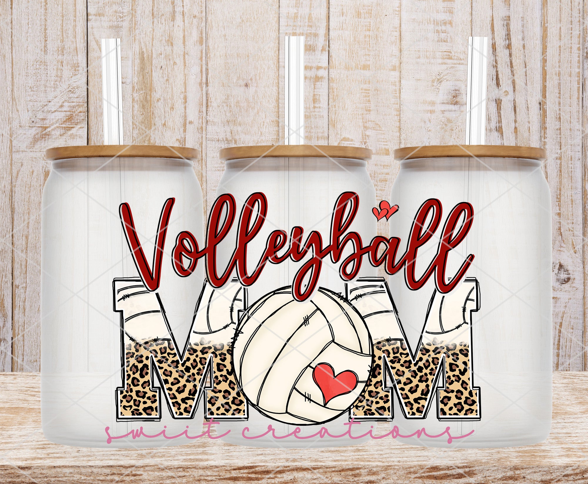 two coffee mugs with volleyball mom on them