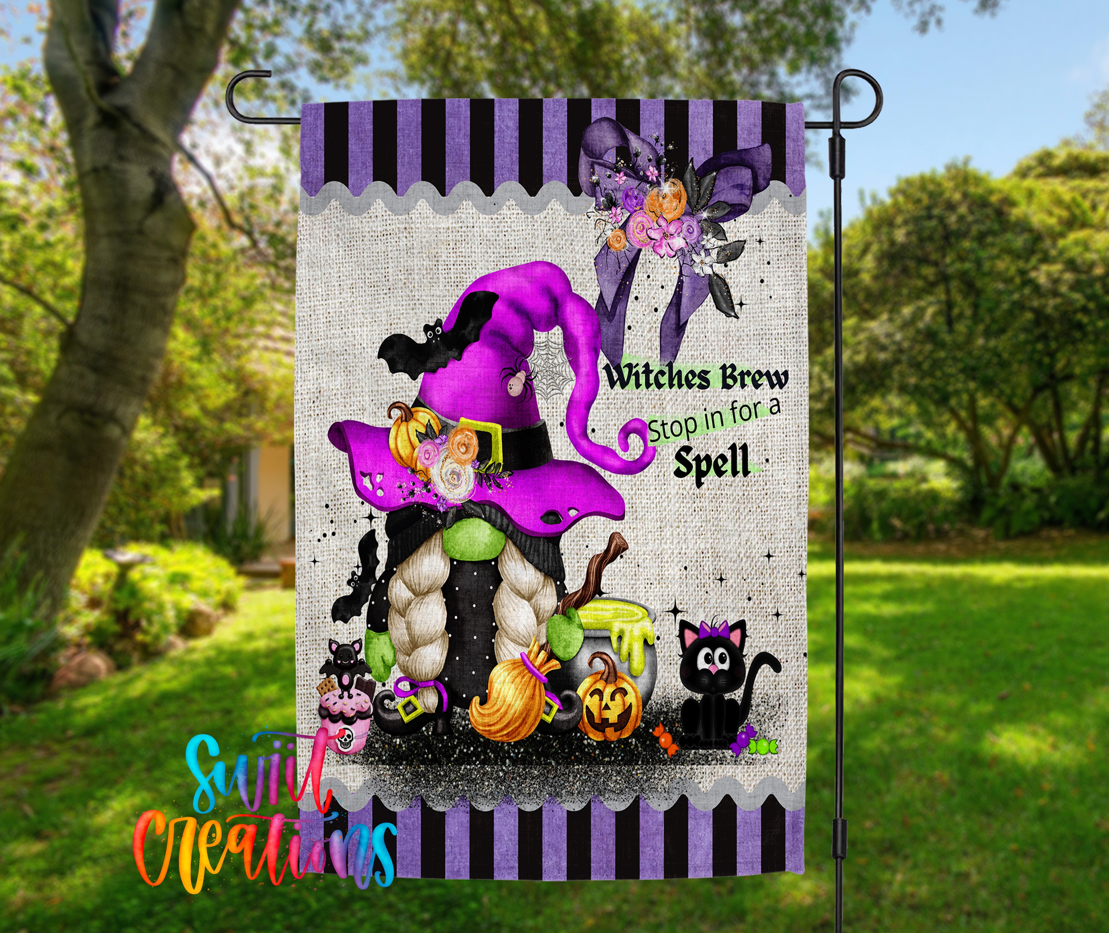 A Halloween-themed garden flag featuring a purple witch's hat, a black cat, a pumpkin, and other Halloween-related elements.