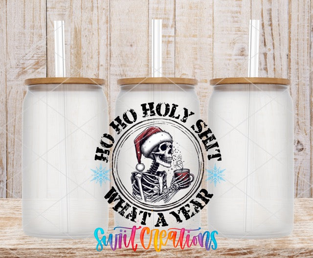 two white coffee mugs with a skeleton wearing a santa hat