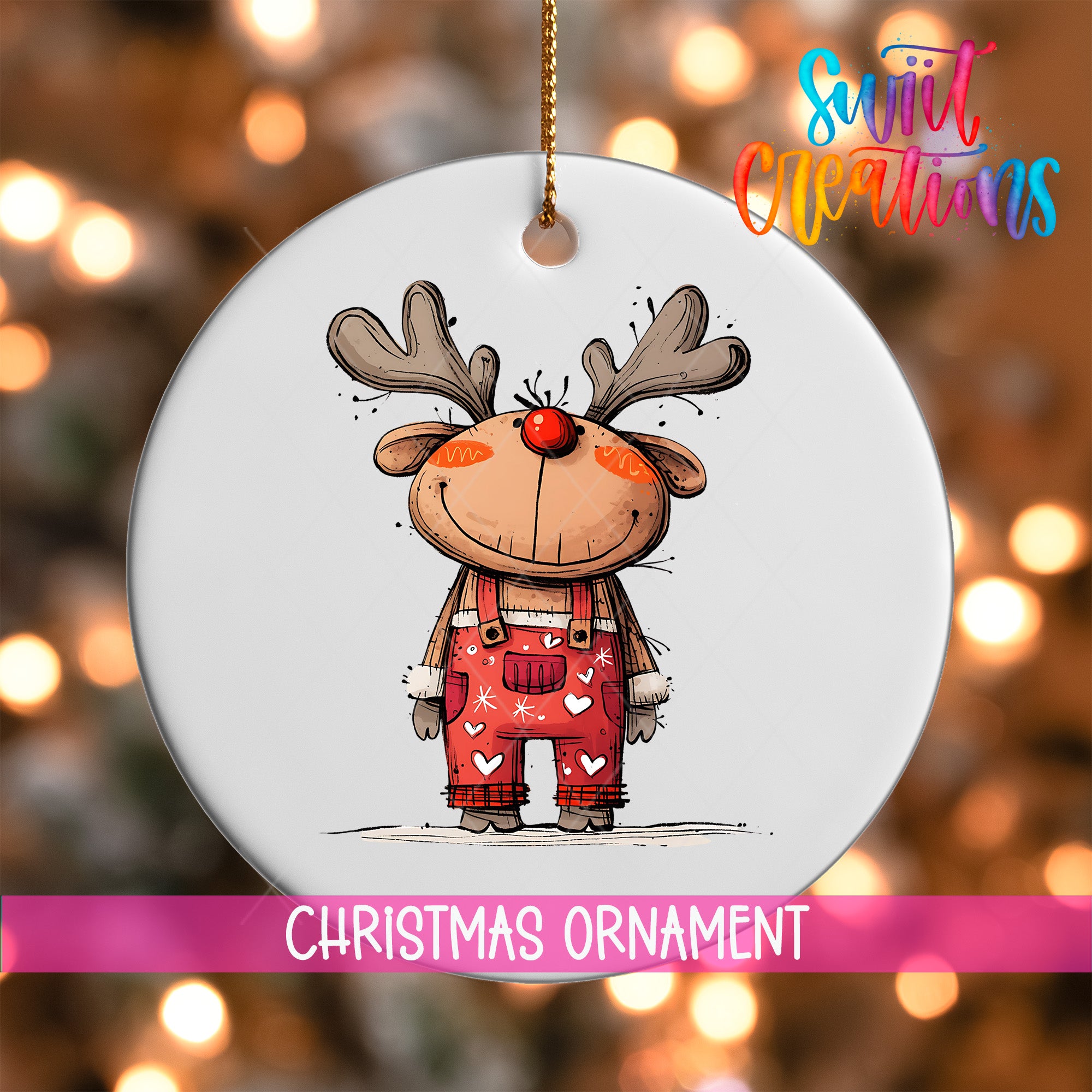 A white Christmas ornament featuring a cartoon reindeer wearing red overalls with white hearts.
