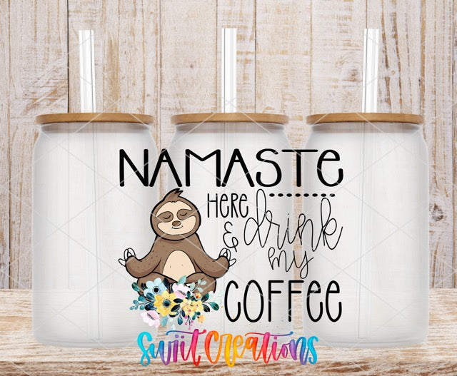 a coffee mug with a slotty on it and the words namaste here