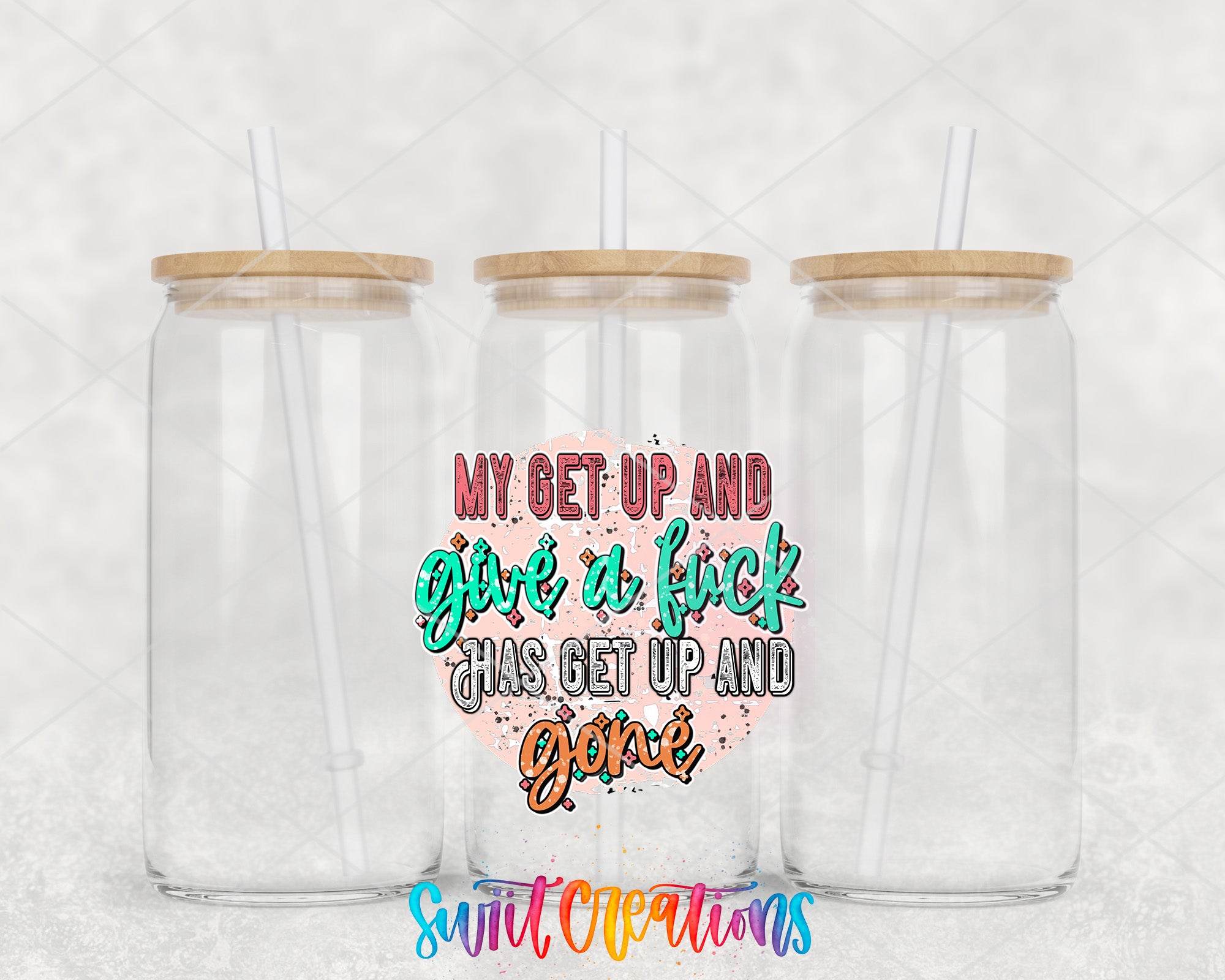 two clear tumblers with wooden lids on a white background