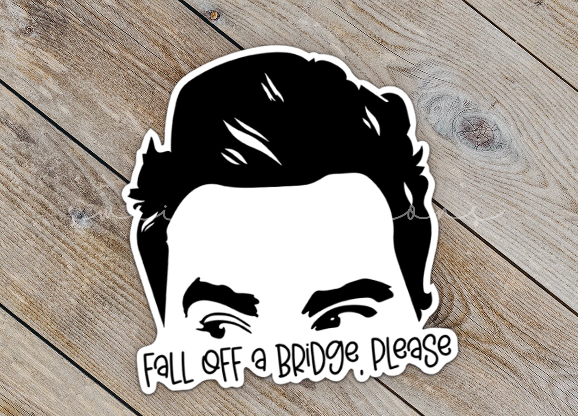 a sticker of a man's face with the words fall off a drive