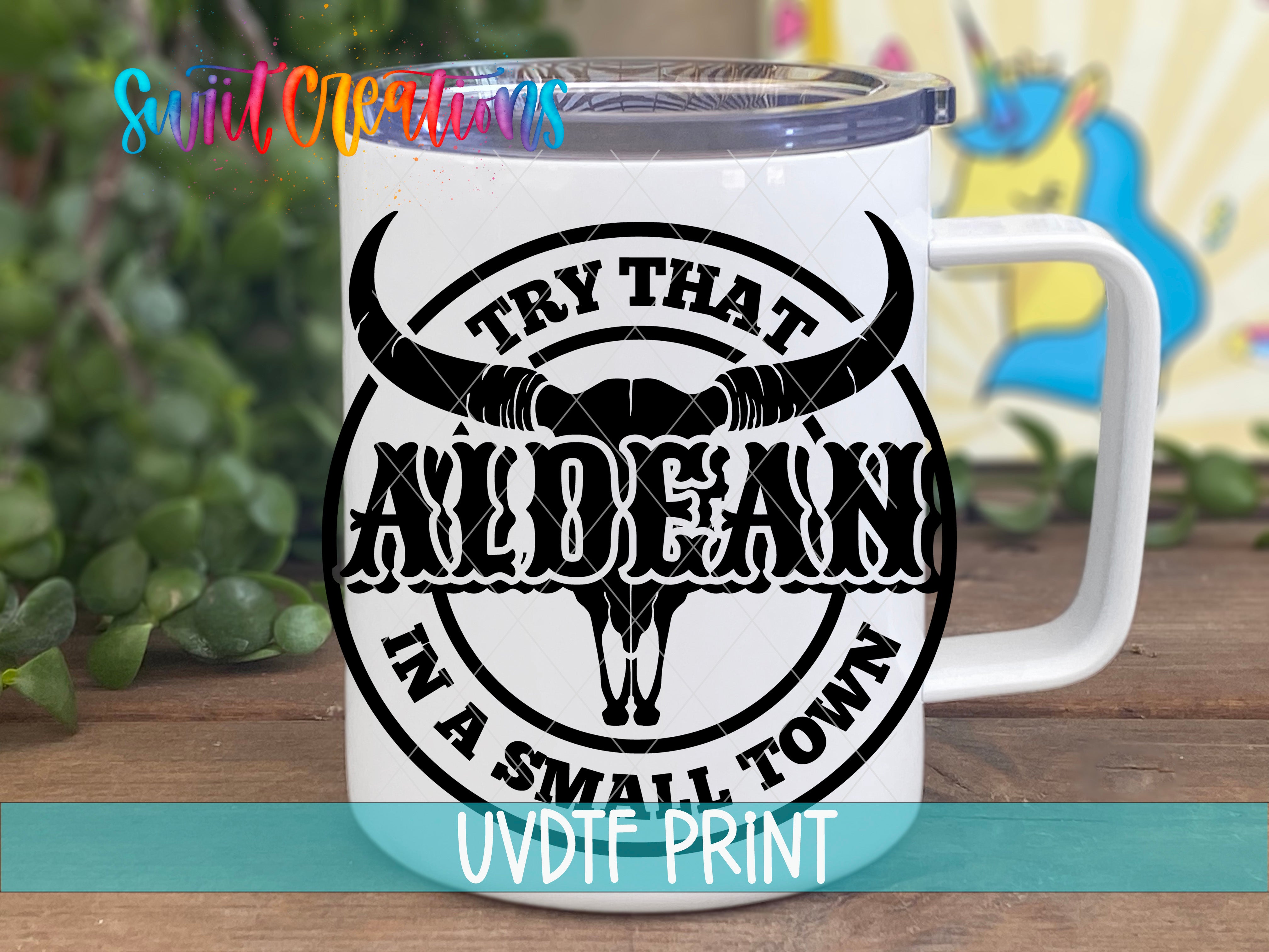 a white coffee mug with an image of a bull's head on it