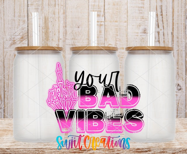 two coffee mugs with the words you're bad vibes on them