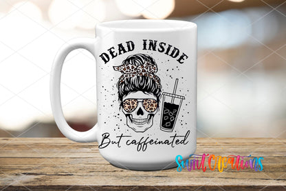 Dead Inside But Caffeinated messy bun skull with iced coffee UV DTF transfer on a white ceramic coffee mug