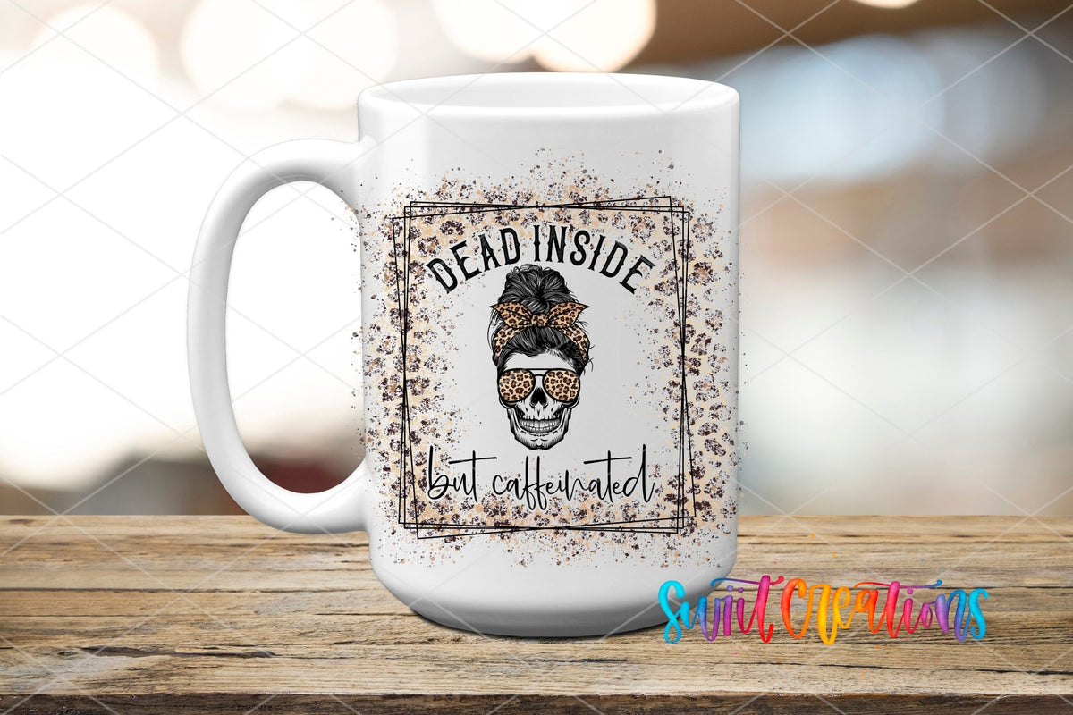 Dead Inside But Caffeinated leopard messy bun skull UV DTF transfer on a white ceramic coffee mug