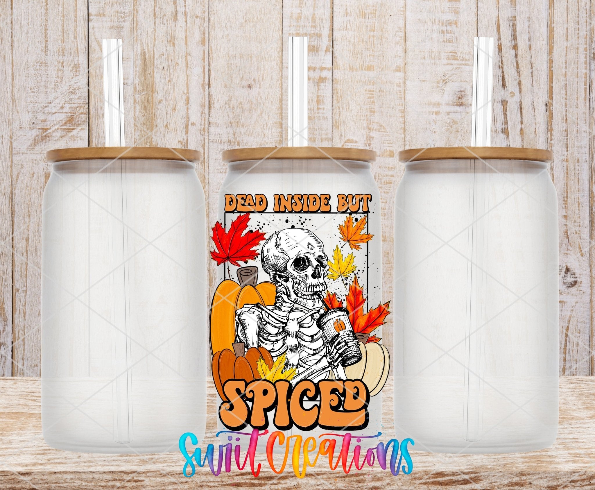 Dead Inside But Spiced Pumpkin Skeleton UV DTF transfer applied to a clear glass can set from Swiit Creations