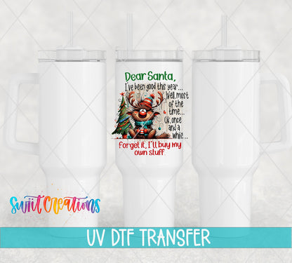 Dear Santa I'll Buy My Own Stuff UV DTF transfer on white 40 oz tumblers