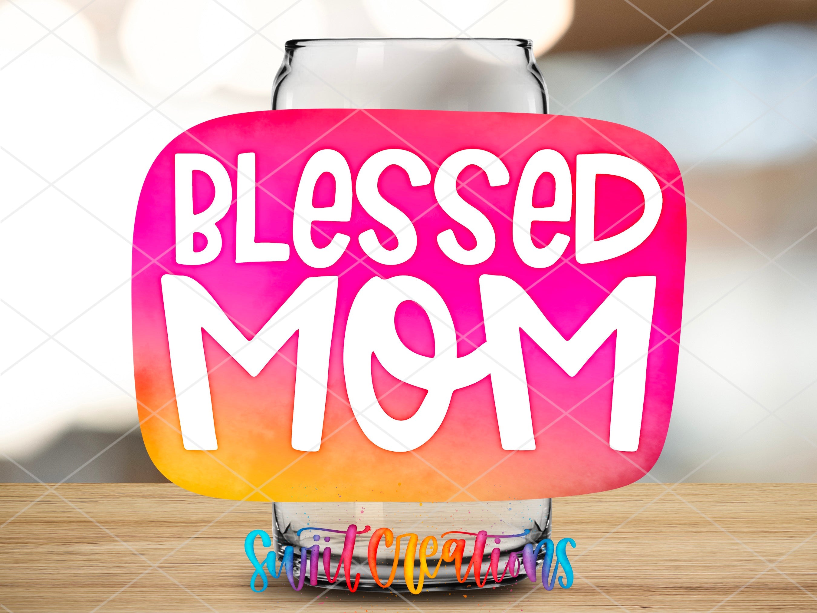 a glass with a message on it that says, blessed mom