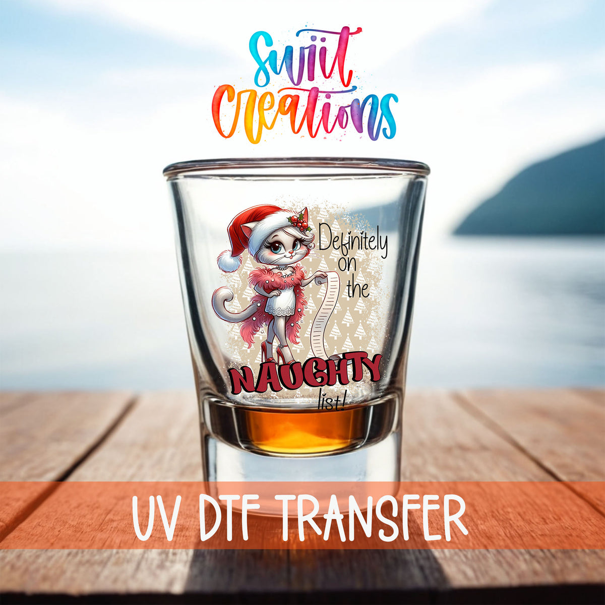 Definitely on the Naughty List Christmas shot glass UV DTF transfer on a filled shot glass on a dock by the water