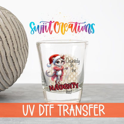 Definitely on the Naughty List Christmas UV DTF transfer on a clear shot glass with the Swiit Creations logo and UV DTF Transfer banner