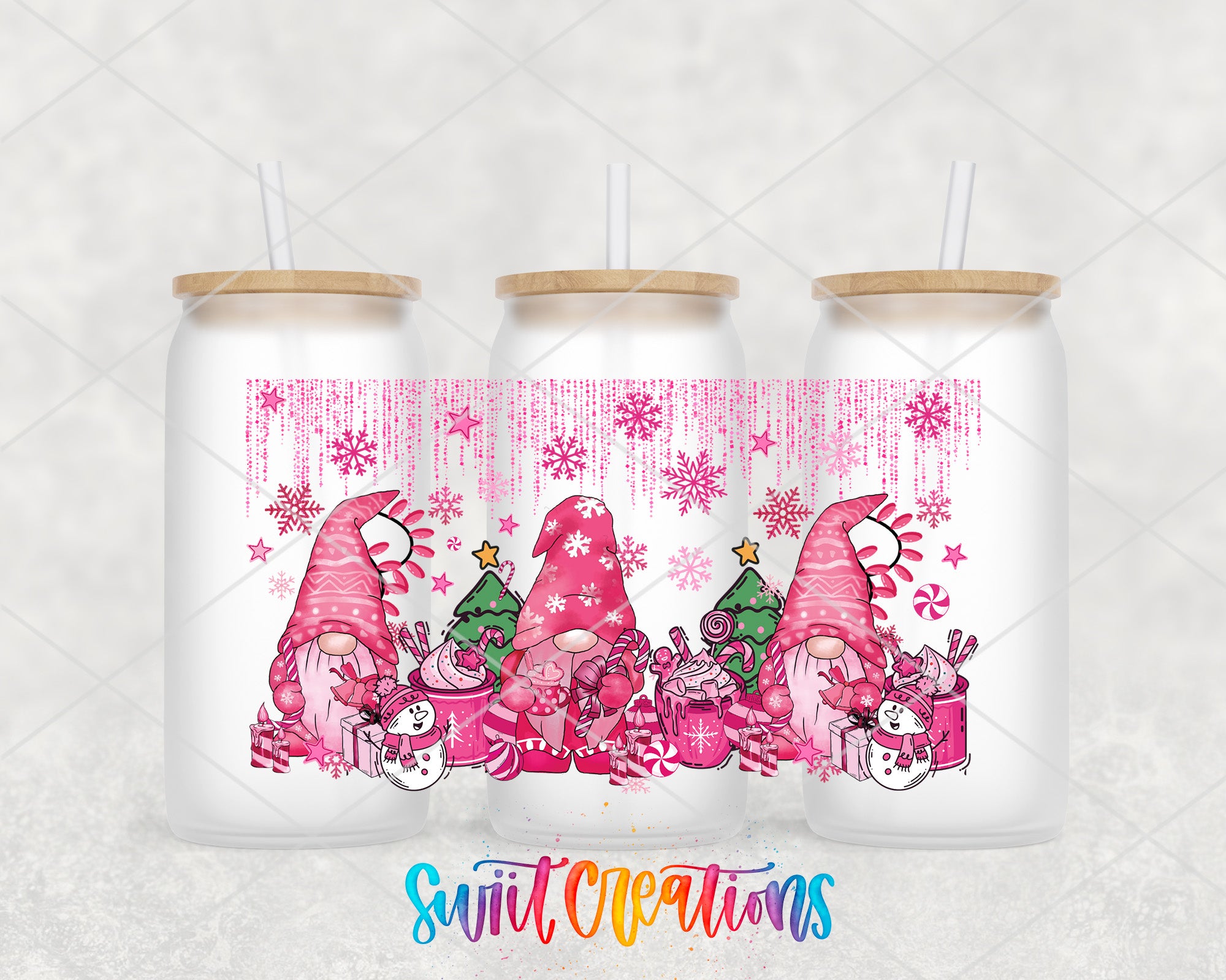 A trio of frosted glass tumblers with a whimsical Christmas-themed design featuring pink gnomes, snowflakes, and Christmas trees.