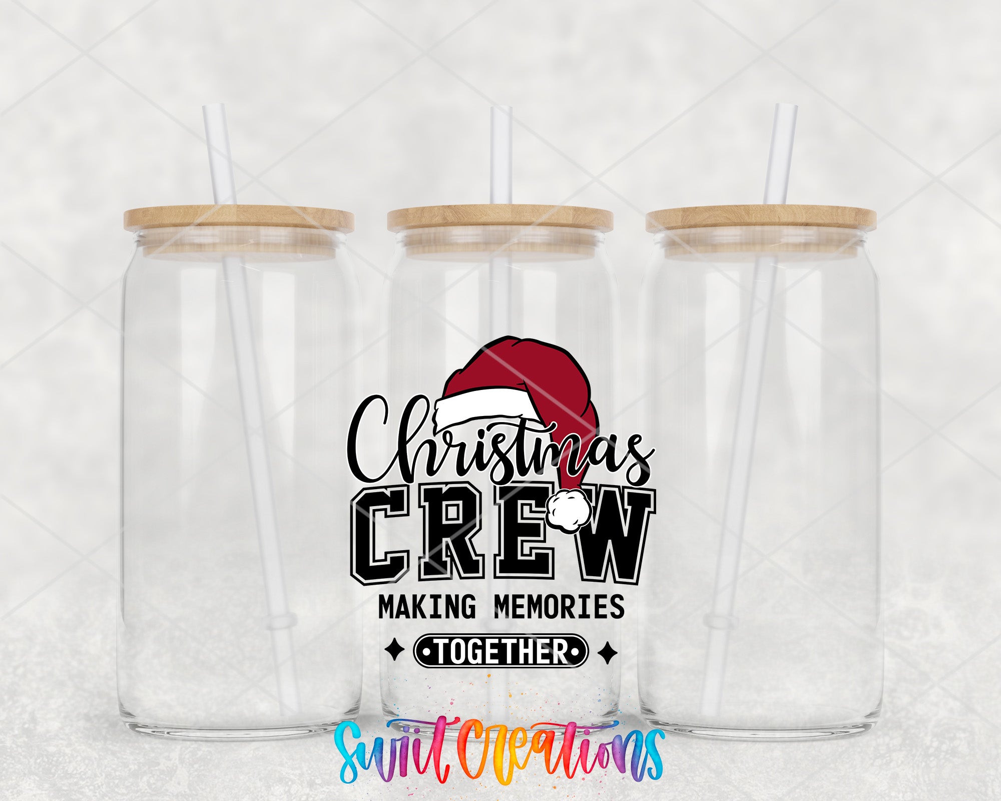 two clear tumblers with a santa hat on them