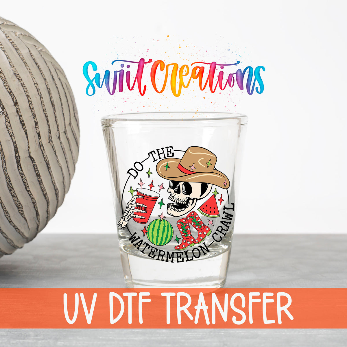 Do The Watermelon Crawl UV DTF transfer on a clear shot glass with the Swiit Creations logo and UV DTF Transfer banner
