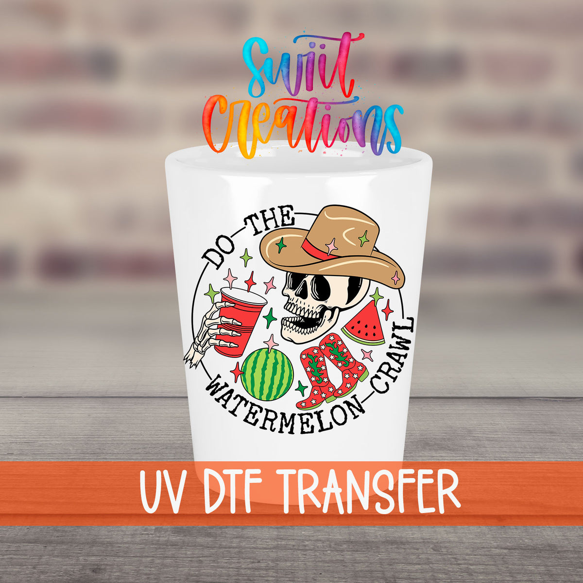 Do The Watermelon Crawl UV DTF transfer on a white shot glass in front of a brick wall