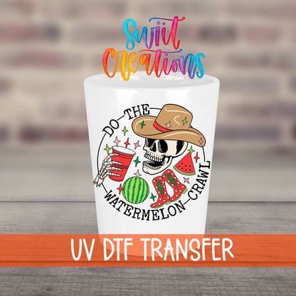 Do The Watermelon Crawl UV DTF transfer on a white shot glass in front of a brick wall
