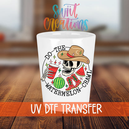 Do The Watermelon Crawl shot glass transfer on a white shot glass on a wooden table
