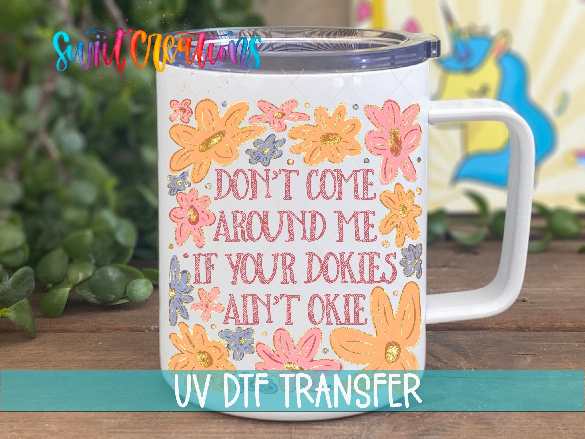 Dokies Ain’t Okie UV DTF transfer displayed on a white coffee mug from Swiit Creations