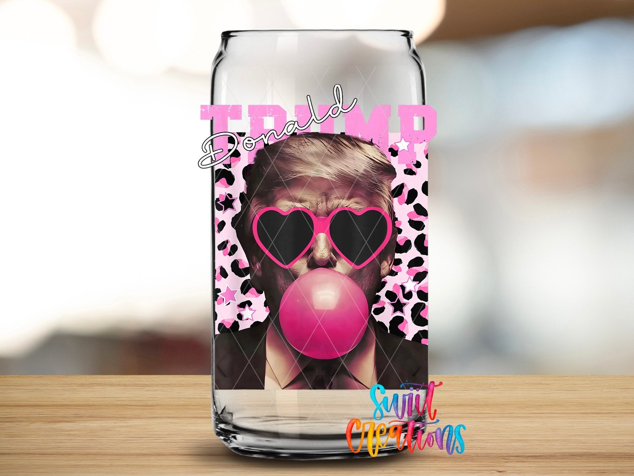 Donald Trump Pink Bubble Gum UV DTF transfer applied to a clear glass can from Swiit Creations