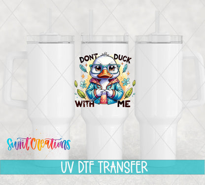 Don't Duck With Me duck in a blue jacket UV DTF transfer on white 40 oz tumblers