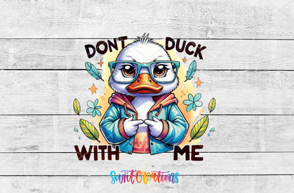 Don't Duck With Me duck in a blue jacket UV DTF transfer artwork on a white wood background
