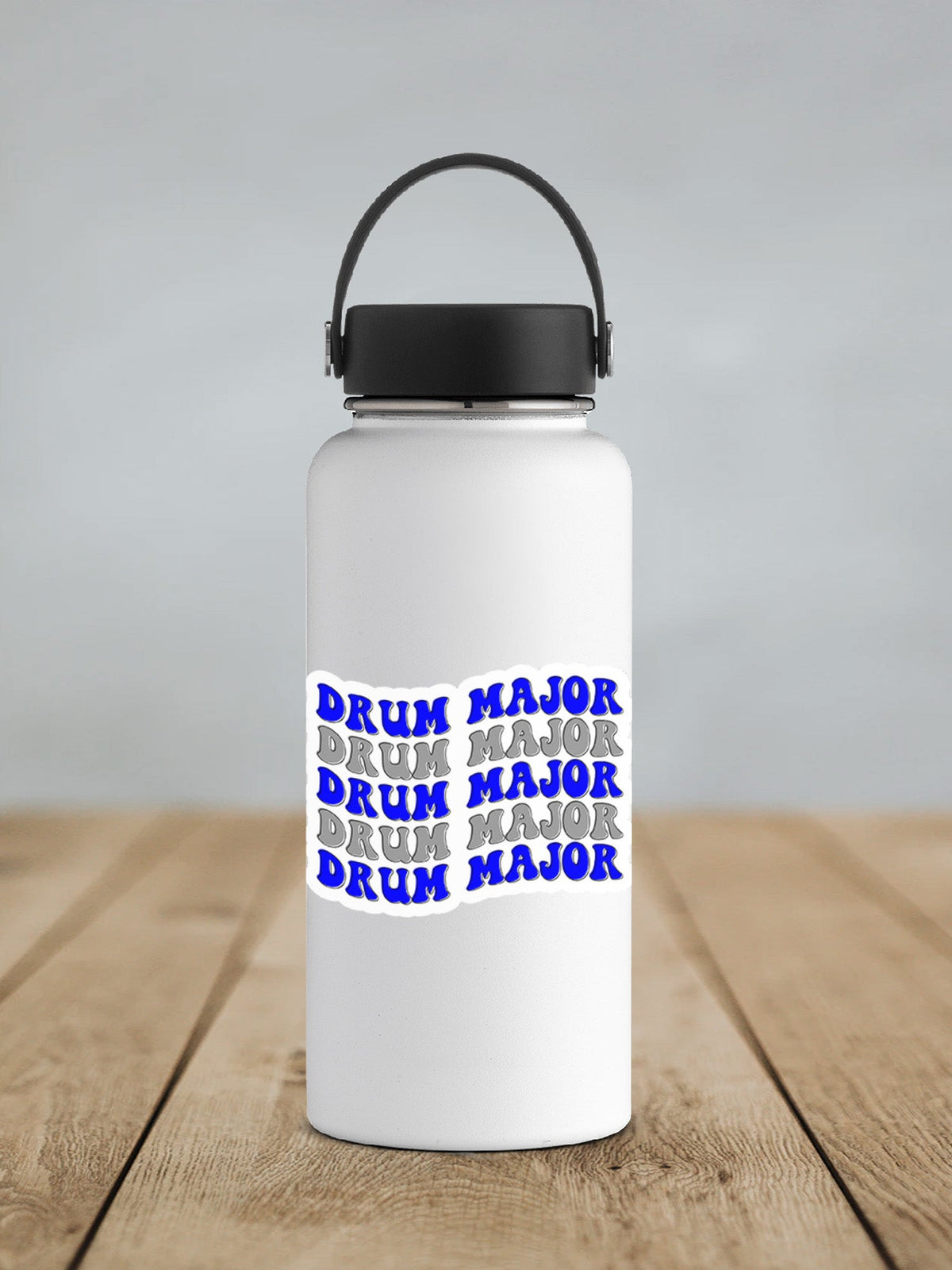 Blue and Silver Drum Major sticker on a white insulated water bottle