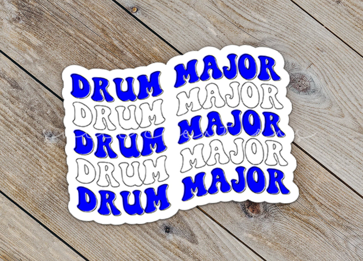 Close-up of the Blue and White Drum Major sticker on rustic wood