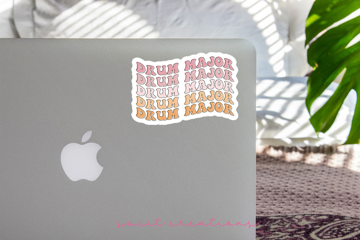 Retro Drum Major sticker on the lid of a silver laptop
