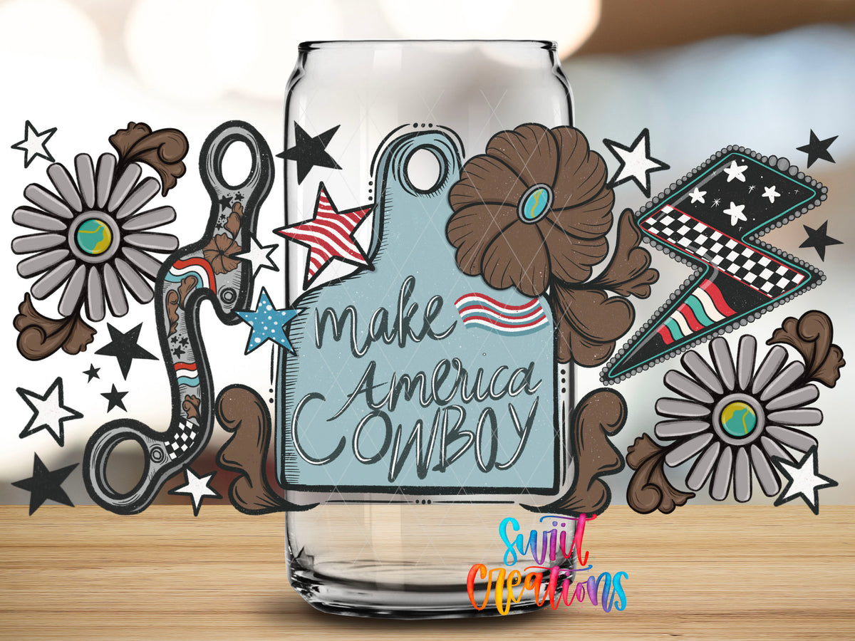 Make America Cowboy UV DTF Full Wrap with a blue cattle tag, horse bit and patterned lightning bolt on a clear glass.