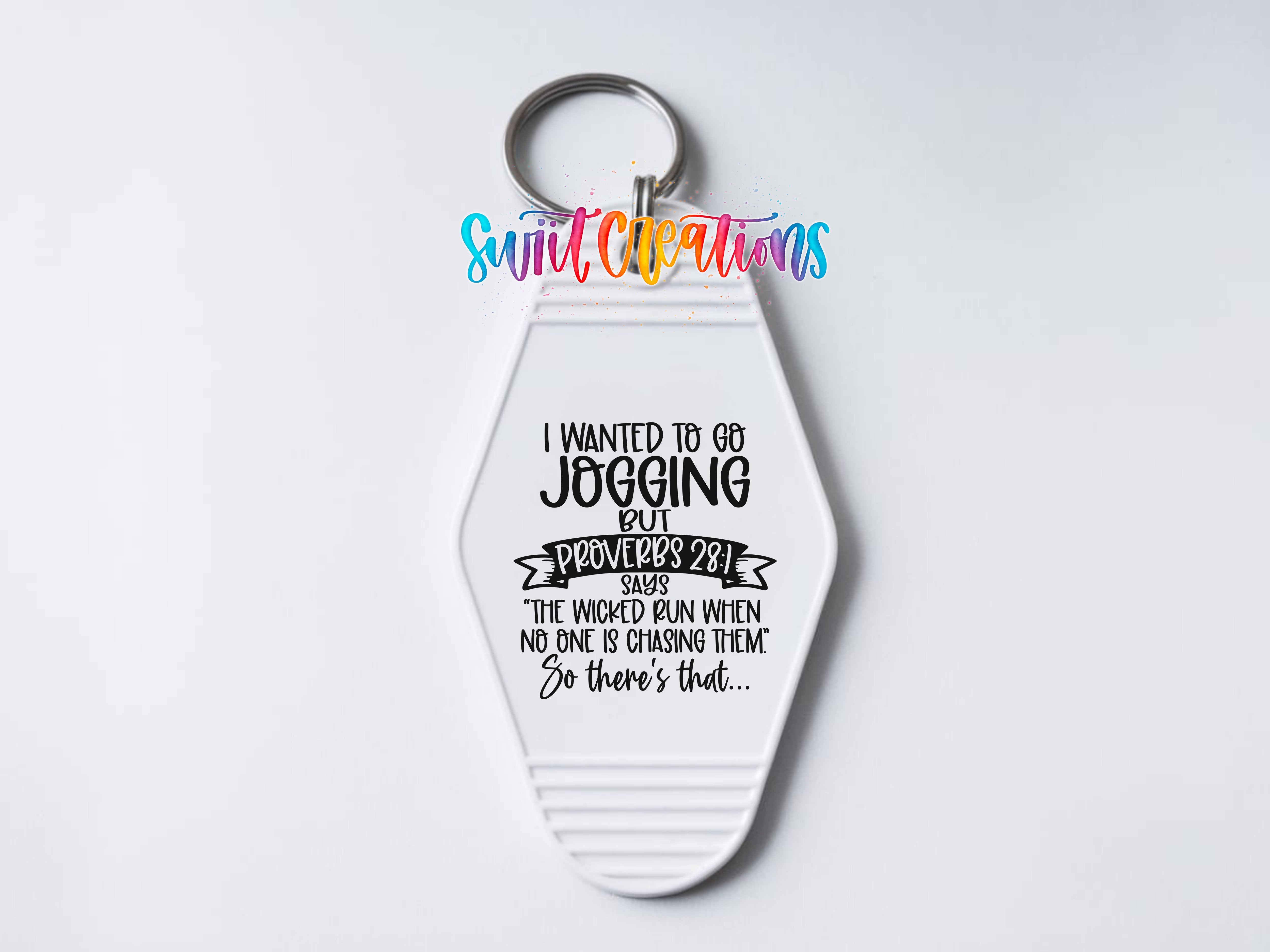A keychain with a humorous text that reads "I WANTED TO GO JOGGING BUT PROVIDERS DIED THE WITCHED RUN WHEN NO ONE IS CHASING THEM SO THERE'S THAT..."