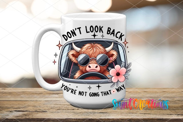 a coffee mug with a cow wearing sunglasses