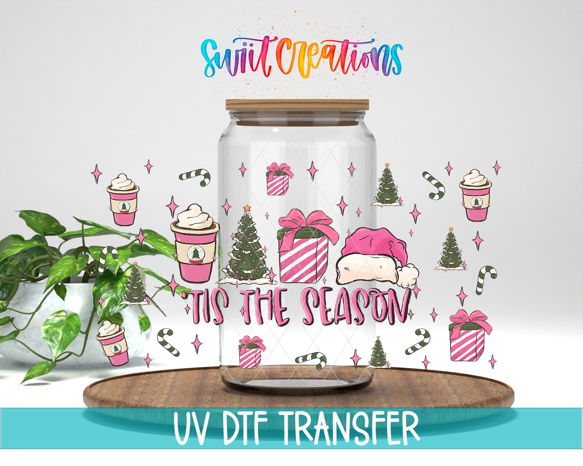 a glass jar with a festive design, including Christmas trees, presents, and a Santa hat, along with the text "Tis the Season" and "Swift Creations".