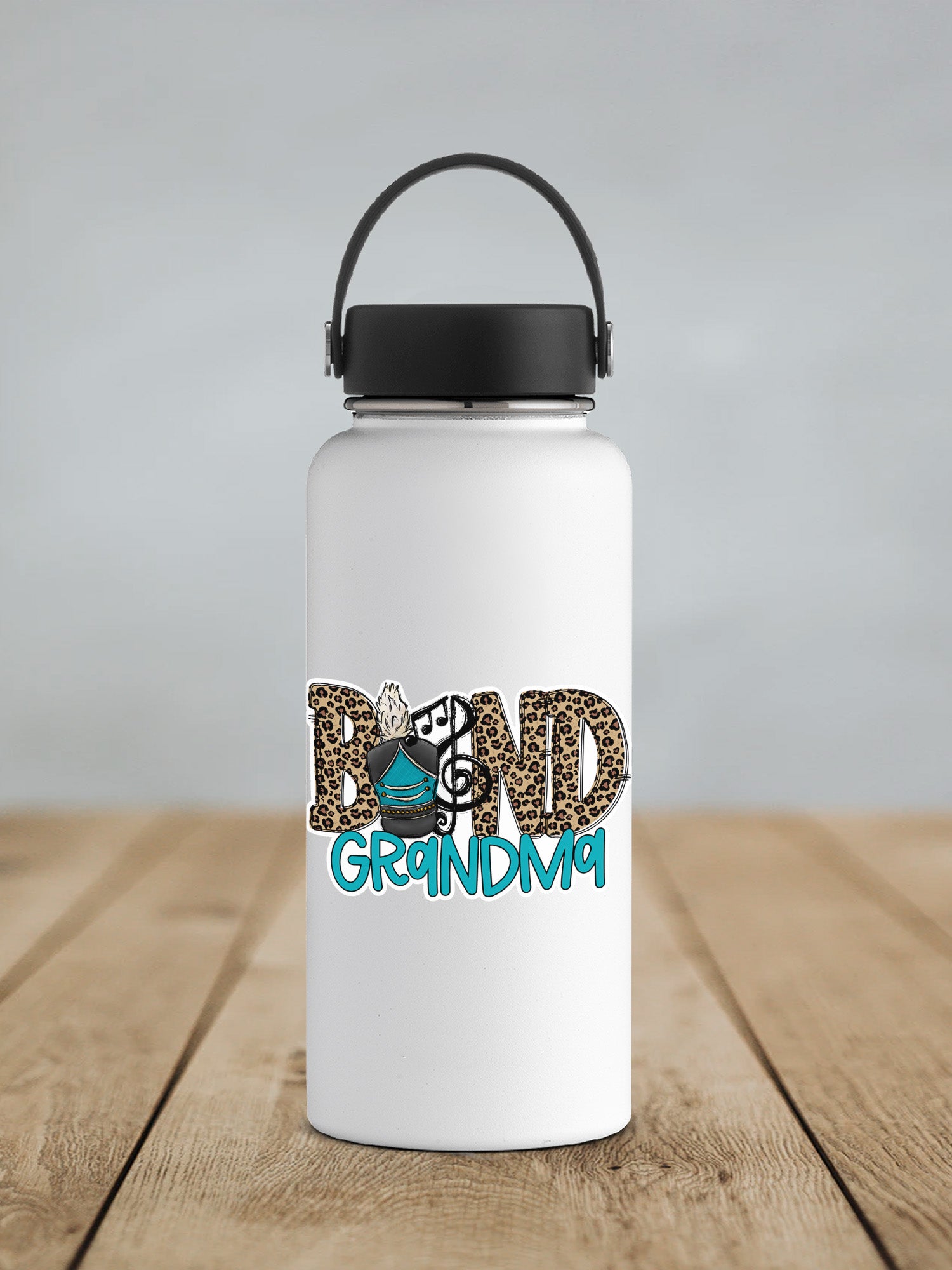 a white water bottle sitting on top of a wooden table