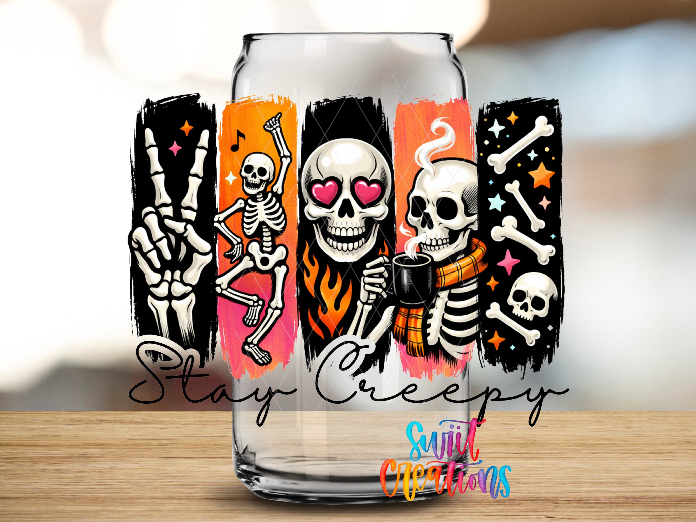 Stay Creepy UV DTF transfer on a glass jar featuring colorful dancing skeletons, skulls, bones, flames, and stars by Swiit Creations.