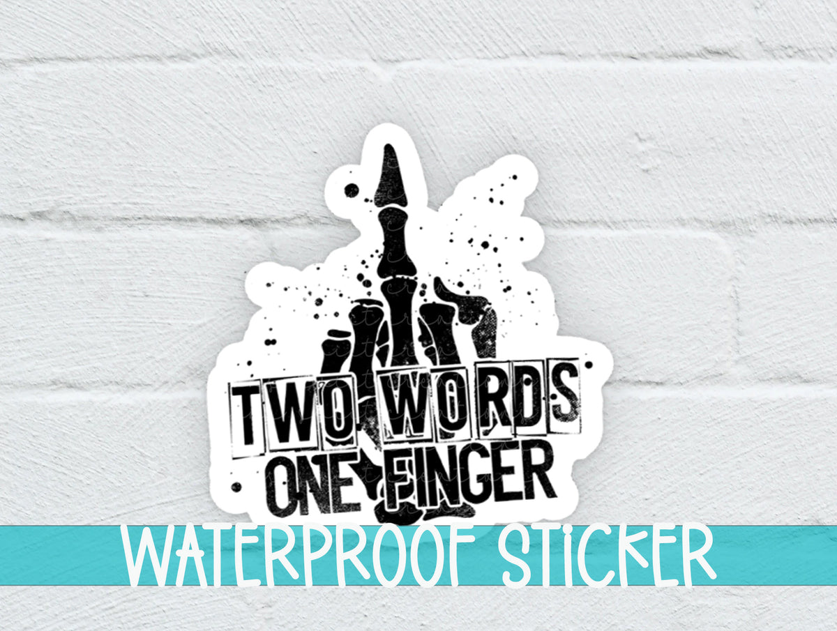 Two Words One Finger sticker on a white brick background with a waterproof sticker banner