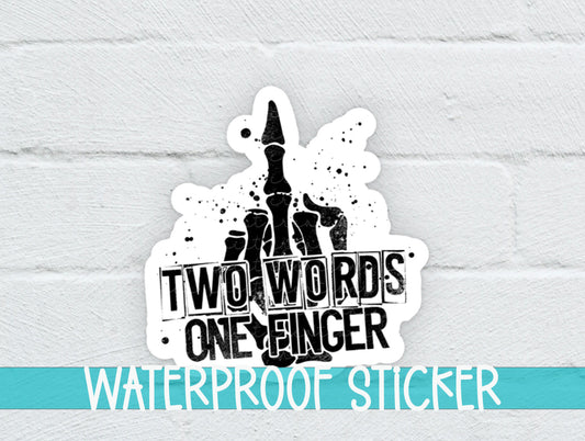 a white brick wall with a sticker on it