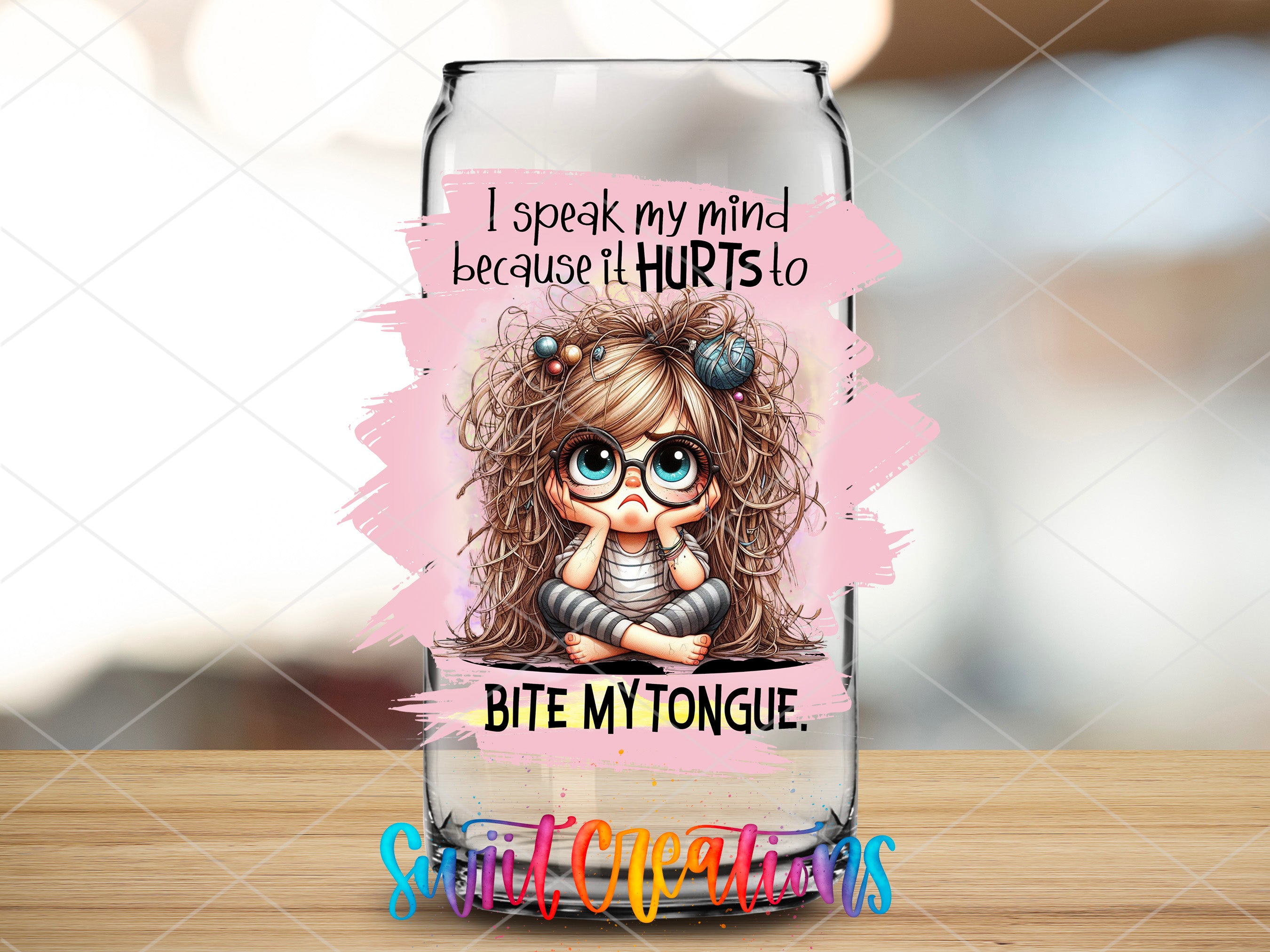 a glass with a picture of a girl on it